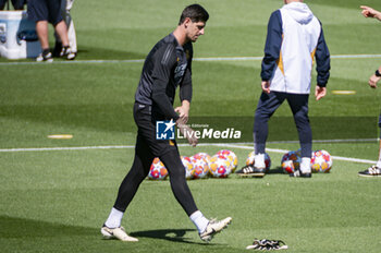 2024-05-07 - MADRID, SPAIN - MAY 7: Thibaut Courtois of Real Madrid warms up during Real Madrid Training Session and Press Conference ahead of their UEFA Champions League semi-final second leg match against FC Bayern Munchen at Ciudad Real Madrid on May 7, 2024 in Valdebebas, Spain. - REAL MADRID VS BAYERN MUNICH: REAL MADRID PRESS CONFERENCE AND TRAINING SESSION - UEFA CHAMPIONS LEAGUE - SOCCER