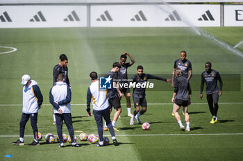 2024-05-07 - MADRID, SPAIN - MAY 7: Real Madrid players (from L to R) Jude Bellingham, Vinicius Junior, Rodrygo Silva de Goes, Luka Modric and Ferland Mendy warms up during Real Madrid Training Session and Press Conference ahead of their UEFA Champions League semi-final second leg match against FC Bayern Munchen at Ciudad Real Madrid on May 7, 2024 in Valdebebas, Spain. - REAL MADRID VS BAYERN MUNICH: REAL MADRID PRESS CONFERENCE AND TRAINING SESSION - UEFA CHAMPIONS LEAGUE - SOCCER