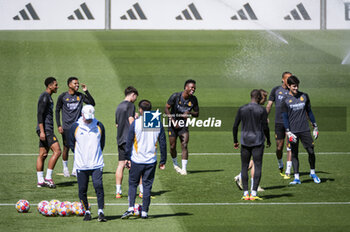 07/05/2024 - MADRID, SPAIN - MAY 7: Real Madrid players (from L to R) Jude Bellingham, Vinicius Junior, Rodrygo Silva de Goes, Luka Modric warms up during Real Madrid Training Session and Press Conference ahead of their UEFA Champions League semi-final second leg match against FC Bayern Munchen at Ciudad Real Madrid on May 7, 2024 in Valdebebas, Spain. - REAL MADRID VS BAYERN MUNICH: REAL MADRID PRESS CONFERENCE AND TRAINING SESSION - UEFA CHAMPIONS LEAGUE - CALCIO