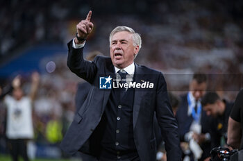 2024-05-08 - MADRID, SPAIN - MAY 8: Carlo Ancelotti, coach of Real Madrid, seen celebrating the victory at the end of the UEFA Champions League semi-final second leg match between Real Madrid and FC Bayern Munchen at Estadio Santiago Bernabeu on May 8, 2024 in Madrid, Spain. - REAL MADRID VS BAYERN MUNICH - UEFA CHAMPIONS LEAGUE - SOCCER