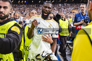 2024-05-08 - MADRID, SPAIN - MAY 8: Antonio Rudiger of Real Madrid seen celebrating the victory with the fans at the end of the UEFA Champions League semi-final second leg match between Real Madrid and FC Bayern Munchen at Estadio Santiago Bernabeu on May 8, 2024 in Madrid, Spain. - REAL MADRID VS BAYERN MUNICH - UEFA CHAMPIONS LEAGUE - SOCCER