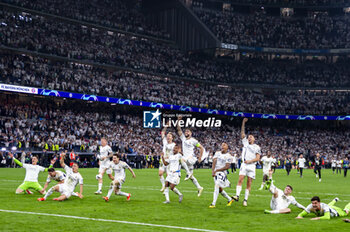 2024-05-08 - MADRID, SPAIN - MAY 8: Real Madrid players seen celebrating the victory at the end of the UEFA Champions League semi-final second leg match between Real Madrid and FC Bayern Munchen at Estadio Santiago Bernabeu on May 8, 2024 in Madrid, Spain. - REAL MADRID VS BAYERN MUNICH - UEFA CHAMPIONS LEAGUE - SOCCER