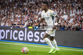 08/05/2024 - MADRID, SPAIN - MAY 8: Vinicius Junior of Real Madrid seen in action with the ball during the UEFA Champions League semi-final second leg match between Real Madrid and FC Bayern Munchen at Estadio Santiago Bernabeu on May 8, 2024 in Madrid, Spain. - REAL MADRID VS BAYERN MUNICH - UEFA CHAMPIONS LEAGUE - CALCIO