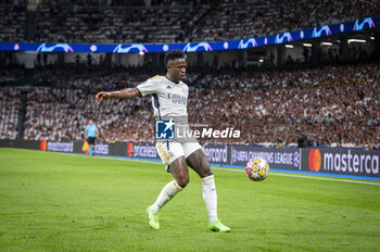 2024-05-08 - MADRID, SPAIN - MAY 8: Vinicius Junior of Real Madrid seen in action with the ball during the UEFA Champions League semi-final second leg match between Real Madrid and FC Bayern Munchen at Estadio Santiago Bernabeu on May 8, 2024 in Madrid, Spain. - REAL MADRID VS BAYERN MUNICH - UEFA CHAMPIONS LEAGUE - SOCCER