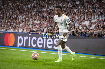 2024-05-08 - MADRID, SPAIN - MAY 8: Vinicius Junior of Real Madrid seen in action with the ball during the UEFA Champions League semi-final second leg match between Real Madrid and FC Bayern Munchen at Estadio Santiago Bernabeu on May 8, 2024 in Madrid, Spain. - REAL MADRID VS BAYERN MUNICH - UEFA CHAMPIONS LEAGUE - SOCCER