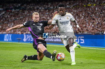 2024-05-08 - MADRID, SPAIN - MAY 8: Vinicius Junior of Real Madrid (R) seen in action against Eric Dier of FC Bayern Munchen (L) during the UEFA Champions League semi-final second leg match between Real Madrid and FC Bayern Munchen at Estadio Santiago Bernabeu on May 8, 2024 in Madrid, Spain. - REAL MADRID VS BAYERN MUNICH - UEFA CHAMPIONS LEAGUE - SOCCER