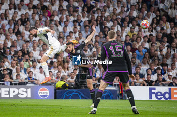 2024-05-08 - MADRID, SPAIN - MAY 8: Daniel Carvajal of Real Madrid (L) seen in action against Noussair Mazraoui of FC Bayern Munchen (R) during the UEFA Champions League semi-final second leg match between Real Madrid and FC Bayern Munchen at Estadio Santiago Bernabeu on May 8, 2024 in Madrid, Spain. - REAL MADRID VS BAYERN MUNICH - UEFA CHAMPIONS LEAGUE - SOCCER