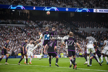 2024-05-08 - MADRID, SPAIN - MAY 8: Nacho Fernandez of Real Madrid (L) fights for the ball against Harry Kane (C) and Eric Dier (R) of FC Bayern Munchen during the UEFA Champions League semi-final second leg match between Real Madrid and FC Bayern Munchen at Estadio Santiago Bernabeu on May 8, 2024 in Madrid, Spain. - REAL MADRID VS BAYERN MUNICH - UEFA CHAMPIONS LEAGUE - SOCCER