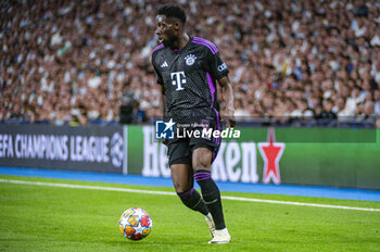 2024-05-08 - MADRID, SPAIN - MAY 8: Alphonso Davies of FC Bayern Munchen seen in action with the ball during the UEFA Champions League semi-final second leg match between Real Madrid and FC Bayern Munchen at Estadio Santiago Bernabeu on May 8, 2024 in Madrid, Spain. - REAL MADRID VS BAYERN MUNICH - UEFA CHAMPIONS LEAGUE - SOCCER