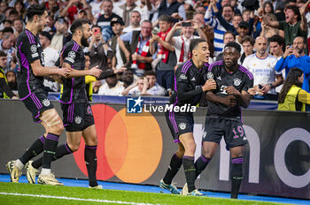 08/05/2024 - MADRID, SPAIN - MAY 8: Alphonso Davies of FC Bayern Munchen (R) seen celebrating his goal with Jamal Musitala of FC Bayern Munchen (L) during the UEFA Champions League semi-final second leg match between Real Madrid and FC Bayern Munchen at Estadio Santiago Bernabeu on May 8, 2024 in Madrid, Spain. - REAL MADRID VS BAYERN MUNICH - UEFA CHAMPIONS LEAGUE - CALCIO