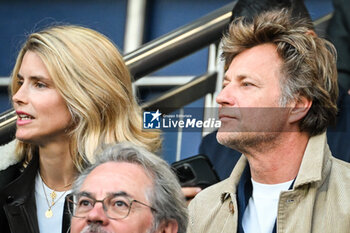 2024-05-07 - Laurent DELAHOUSSE and his partner Alice TAGLIONI during the UEFA Champions League, Semi-finals, 2nd leg football match between Paris Saint-Germain and Borussia Dortmund on May 7, 2024 at Parc des Princes stadium in Paris, France - FOOTBALL - CHAMPIONS LEAGUE - PARIS SG V DORTMUND - UEFA CHAMPIONS LEAGUE - SOCCER