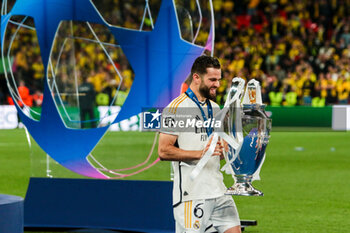 2024-06-01 - Nacho Fernandez of Real Madrid with Champions League trophy - FINAL - BORUSSIA DORTMUND VS REAL MADRID - UEFA CHAMPIONS LEAGUE - SOCCER