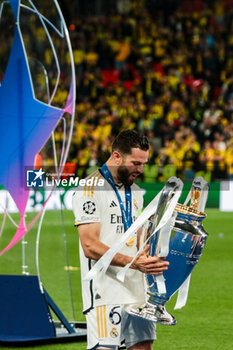 2024-06-01 - Nacho Fernandez of Real Madrid with Champions League trophy - FINAL - BORUSSIA DORTMUND VS REAL MADRID - UEFA CHAMPIONS LEAGUE - SOCCER