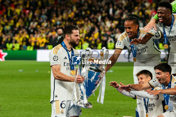 2024-06-01 - Nacho Fernandez of Real Madrid with Champions League trophy - FINAL - BORUSSIA DORTMUND VS REAL MADRID - UEFA CHAMPIONS LEAGUE - SOCCER