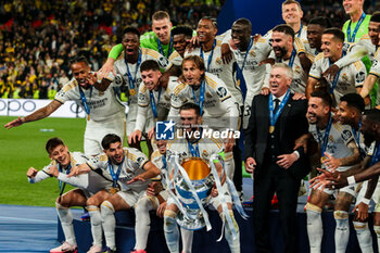 2024-06-01 - Nacho Fernandez of Real Madrid with Champions League trophy and Real Madrid team - FINAL - BORUSSIA DORTMUND VS REAL MADRID - UEFA CHAMPIONS LEAGUE - SOCCER