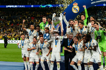 2024-06-01 - Nacho Fernandez of Real Madrid with Champions League trophy and Real Madrid team - FINAL - BORUSSIA DORTMUND VS REAL MADRID - UEFA CHAMPIONS LEAGUE - SOCCER