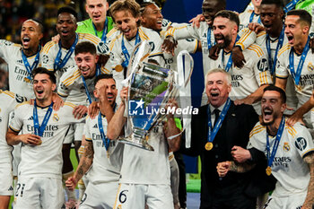 2024-06-01 - Nacho Fernandez of Real Madrid with Champions League trophy and Real Madrid team - FINAL - BORUSSIA DORTMUND VS REAL MADRID - UEFA CHAMPIONS LEAGUE - SOCCER