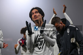 2024-11-05 - Monaco’s Takumi Minamino greets the fans at the end of the match - BOLOGNA FC VS AS MONACO - UEFA CHAMPIONS LEAGUE - SOCCER