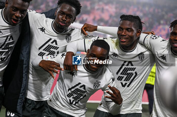 2024-11-05 - AS Monaco FC player celebrates a victory at the end of match - BOLOGNA FC VS AS MONACO - UEFA CHAMPIONS LEAGUE - SOCCER