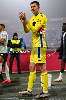 2024-11-05 - Monaco’s Radoslaw Majecki celebrates a victory at the end of match - BOLOGNA FC VS AS MONACO - UEFA CHAMPIONS LEAGUE - SOCCER