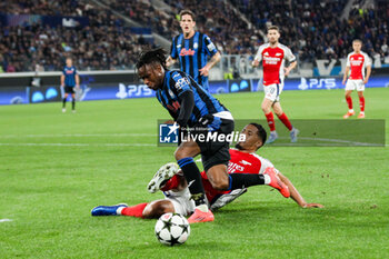 2024-09-19 - Ademola Lookman (Atalanta BC ) William Saliba (Arsenal FC ), 1° UEFA Champions League AtalantaBC vs ArsenalFC 2024-25 game at Gewiss Stadium in Bergamo (BG), Italy, 19.09.2024.
Photo by Marius Bunduc/LiveMedia - ATALANTA BC VS ARSENAL FC - UEFA CHAMPIONS LEAGUE - SOCCER