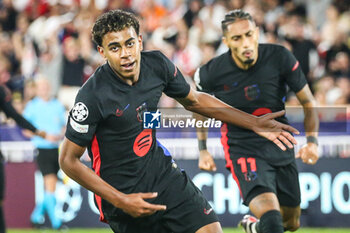 2024-09-19 - Lamine YAMAL of Barcelona celebrate his goal with Raphael DIAS BELLOLI (Raphinha) of Barcelona during the UEFA Champions League, League Phase MD1 football match between AS Monaco and FC Barcelona on September 19, 2024 at Louis II stadium in Monaco, Monaco - FOOTBALL - CHAMPIONS LEAGUE - MONACO V FC BARCELONA - UEFA CHAMPIONS LEAGUE - SOCCER