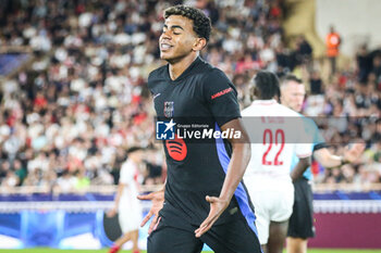 2024-09-19 - Lamine YAMAL of Barcelona celebrates his goal during the UEFA Champions League, League Phase MD1 football match between AS Monaco and FC Barcelona on September 19, 2024 at Louis II stadium in Monaco, Monaco - FOOTBALL - CHAMPIONS LEAGUE - MONACO V FC BARCELONA - UEFA CHAMPIONS LEAGUE - SOCCER