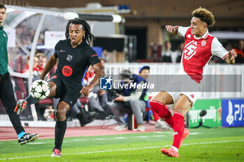 2024-09-19 - Jules KOUNDE of Barcelona and Eliesse BEN SEGHIR of Monaco during the UEFA Champions League, League Phase MD1 football match between AS Monaco and FC Barcelona on September 19, 2024 at Louis II stadium in Monaco, Monaco - FOOTBALL - CHAMPIONS LEAGUE - MONACO V FC BARCELONA - UEFA CHAMPIONS LEAGUE - SOCCER