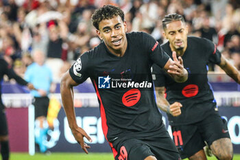 2024-09-19 - Lamine YAMAL of Barcelona celebrate his goal with Raphael DIAS BELLOLI (Raphinha) of Barcelona during the UEFA Champions League, League Phase MD1 football match between AS Monaco and FC Barcelona on September 19, 2024 at Louis II stadium in Monaco, Monaco - FOOTBALL - CHAMPIONS LEAGUE - MONACO V FC BARCELONA - UEFA CHAMPIONS LEAGUE - SOCCER