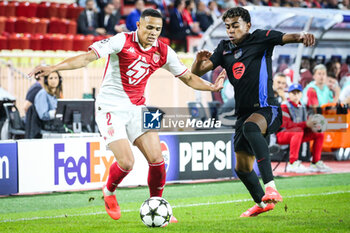 2024-09-19 - Vanderson DE OLIVEIRA CAMPOS of Monaco and Lamine YAMAL of Barcelona during the UEFA Champions League, League Phase MD1 football match between AS Monaco and FC Barcelona on September 19, 2024 at Louis II stadium in Monaco, Monaco - FOOTBALL - CHAMPIONS LEAGUE - MONACO V FC BARCELONA - UEFA CHAMPIONS LEAGUE - SOCCER