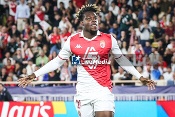 2024-09-19 - George ILENIKHENA of Monaco celebrates his goal during the UEFA Champions League, League Phase MD1 football match between AS Monaco and FC Barcelona on September 19, 2024 at Louis II stadium in Monaco, Monaco - FOOTBALL - CHAMPIONS LEAGUE - MONACO V FC BARCELONA - UEFA CHAMPIONS LEAGUE - SOCCER