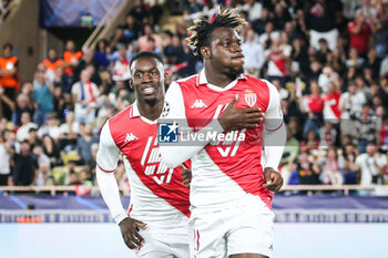 2024-09-19 - George ILENIKHENA of Monaco celebrate his goal with Folarin BALOGUN of Monaco during the UEFA Champions League, League Phase MD1 football match between AS Monaco and FC Barcelona on September 19, 2024 at Louis II stadium in Monaco, Monaco - FOOTBALL - CHAMPIONS LEAGUE - MONACO V FC BARCELONA - UEFA CHAMPIONS LEAGUE - SOCCER