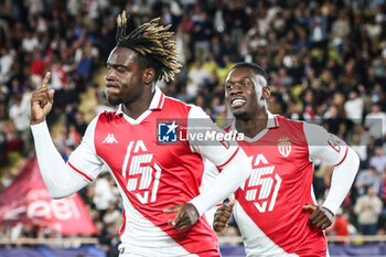 2024-09-19 - George ILENIKHENA of Monaco celebrate his goal with Folarin BALOGUN of Monaco during the UEFA Champions League, League Phase MD1 football match between AS Monaco and FC Barcelona on September 19, 2024 at Louis II stadium in Monaco, Monaco - FOOTBALL - CHAMPIONS LEAGUE - MONACO V FC BARCELONA - UEFA CHAMPIONS LEAGUE - SOCCER