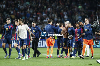 2024-10-23 - Players of FC Barcelona celebrate after winning the UEFA Champions League, League phase, Matchday 3 football match between FC Barcelona and Bayern Munich on 23 October 2024 at Estadi Olímpic Lluís Companys in Barcelona, Spain - FOOTBALL - CHAMPIONS LEAGUE - FC BARCELONA V BAYERN MUNICH - UEFA CHAMPIONS LEAGUE - SOCCER