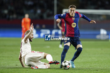 2024-10-23 - Konrad Laimer of Bayern Munich and Pablo Martin Paez Gavira "Gavi" during the UEFA Champions League, League phase, Matchday 3 football match between FC Barcelona and Bayern Munich on 23 October 2024 at Estadi Olímpic Lluís Companys in Barcelona, Spain - FOOTBALL - CHAMPIONS LEAGUE - FC BARCELONA V BAYERN MUNICH - UEFA CHAMPIONS LEAGUE - SOCCER