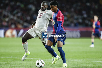 2024-10-23 - Alejandro Balde of FC Barcelona and Dayot Upamecano of Bayern Munich during the UEFA Champions League, League phase, Matchday 3 football match between FC Barcelona and Bayern Munich on 23 October 2024 at Estadi Olímpic Lluís Companys in Barcelona, Spain - FOOTBALL - CHAMPIONS LEAGUE - FC BARCELONA V BAYERN MUNICH - UEFA CHAMPIONS LEAGUE - SOCCER