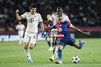 2024-10-23 - Raphinha of FC Barcelona and Kim Min-jae, Dayot Upamecano of Bayern Munich during the UEFA Champions League, League phase, Matchday 3 football match between FC Barcelona and Bayern Munich on 23 October 2024 at Estadi Olímpic Lluís Companys in Barcelona, Spain - FOOTBALL - CHAMPIONS LEAGUE - FC BARCELONA V BAYERN MUNICH - UEFA CHAMPIONS LEAGUE - SOCCER