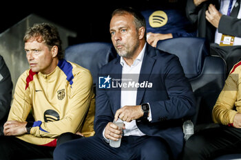 2024-10-23 - Hansi Flick, head coach of FC Barcelona during the UEFA Champions League, League phase, Matchday 3 football match between FC Barcelona and Bayern Munich on 23 October 2024 at Estadi Olímpic Lluís Companys in Barcelona, Spain - FOOTBALL - CHAMPIONS LEAGUE - FC BARCELONA V BAYERN MUNICH - UEFA CHAMPIONS LEAGUE - SOCCER