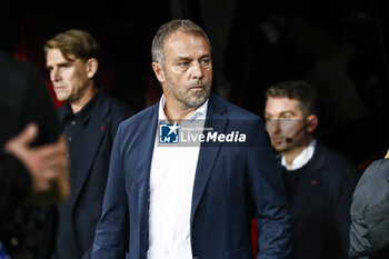 2024-10-23 - Hansi Flick, head coach of FC Barcelona during the UEFA Champions League, League phase, Matchday 3 football match between FC Barcelona and Bayern Munich on 23 October 2024 at Estadi Olímpic Lluís Companys in Barcelona, Spain - FOOTBALL - CHAMPIONS LEAGUE - FC BARCELONA V BAYERN MUNICH - UEFA CHAMPIONS LEAGUE - SOCCER