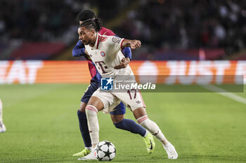 2024-10-23 - Michael Olise of Bayern Munich and Alejandro Balde of FC Barcelona during the UEFA Champions League, League phase, Matchday 3 football match between FC Barcelona and Bayern Munich on 23 October 2024 at Estadi Olímpic Lluís Companys in Barcelona, Spain - FOOTBALL - CHAMPIONS LEAGUE - FC BARCELONA V BAYERN MUNICH - UEFA CHAMPIONS LEAGUE - SOCCER