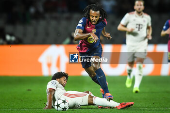 2024-10-23 - Serge GNABRY of Bayern Munich and Jules KOUNDE of Barcelona during the UEFA Champions League, League Phase MD3 football match between FC Barcelona and Bayern Munich on 23 October 2024 at Estadi Olimpic Lluis Companys in Barcelona, Spain - FOOTBALL - CHAMPIONS LEAGUE - FC BARCELONA V BAYERN MUNICH - UEFA CHAMPIONS LEAGUE - SOCCER