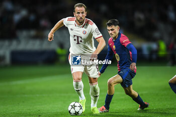 2024-10-23 - Harry KANE of Bayern Munich and Pedro GONZALEZ LOPEZ (Pedri) of Barcelona during the UEFA Champions League, League Phase MD3 football match between FC Barcelona and Bayern Munich on 23 October 2024 at Estadi Olimpic Lluis Companys in Barcelona, Spain - FOOTBALL - CHAMPIONS LEAGUE - FC BARCELONA V BAYERN MUNICH - UEFA CHAMPIONS LEAGUE - SOCCER