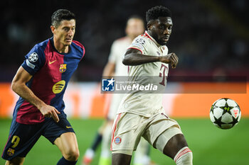 2024-10-23 - Robert LEWANDOWSKI of Barcelona and Alphonso DAVIES of Bayern Munich during the UEFA Champions League, League Phase MD3 football match between FC Barcelona and Bayern Munich on 23 October 2024 at Estadi Olimpic Lluis Companys in Barcelona, Spain - FOOTBALL - CHAMPIONS LEAGUE - FC BARCELONA V BAYERN MUNICH - UEFA CHAMPIONS LEAGUE - SOCCER