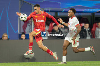 2024-10-23 - RB Leipzig forward Loïs Openda (11) battles with Liverpool defender Trent Alexander-Arnold (66) during the UEFA Champions League, League phase, Matchday 3 football match between RB Leipzig and Liverpool FC on 23 October 2024 at Red Bull Arena in Leipzig, Germany - FOOTBALL - CHAMPIONS LEAGUE - LEIPZIG V LIVERPOOL - UEFA CHAMPIONS LEAGUE - SOCCER