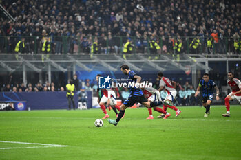 2024-11-06 - Hakan Calhanoglu of FC Internazionale scores a penalty during the UEFA Champions League stage match Phase MD4 between Inter FC Internazionale and Arsenal FC, on 6 of November 2024, at Giuseppe Meazza San Siro Siro stadium in Milan, Italy - INTER - FC INTERNAZIONALE VS ARSENAL FC - UEFA CHAMPIONS LEAGUE - SOCCER