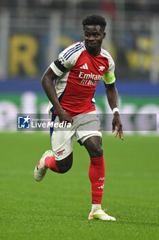 2024-11-06 - Bukayo Saka of Arsenal FC during the UEFA Champions League stage match Phase MD4 between Inter FC Internazionale and Arsenal FC, on 6 of November 2024, at Giuseppe Meazza San Siro Siro stadium in Milan, Italy - INTER - FC INTERNAZIONALE VS ARSENAL FC - UEFA CHAMPIONS LEAGUE - SOCCER