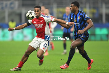 2024-11-06 - JURRIEN TIMBER of Arsenal FC and Denzel Dumfries of Fc Inter during the UEFA Champions League stage match Phase MD4 between Inter FC Internazionale and Arsenal FC, on 6 of November 2024, at Giuseppe Meazza San Siro Siro stadium in Milan, Italy - INTER - FC INTERNAZIONALE VS ARSENAL FC - UEFA CHAMPIONS LEAGUE - SOCCER