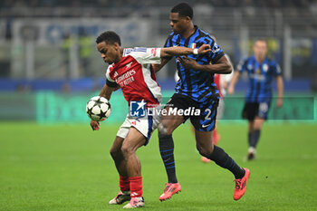 2024-11-06 - JURRIEN TIMBER of Arsenal FC and Denzel Dumfries of Fc Inter during the UEFA Champions League stage match Phase MD4 between Inter FC Internazionale and Arsenal FC, on 6 of November 2024, at Giuseppe Meazza San Siro Siro stadium in Milan, Italy - INTER - FC INTERNAZIONALE VS ARSENAL FC - UEFA CHAMPIONS LEAGUE - SOCCER