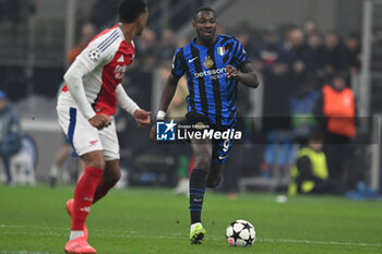 2024-11-06 - Marcus Thuram of FC Inter during the UEFA Champions League stage match Phase MD4 between Inter FC Internazionale and Arsenal FC, on 6 of November 2024, at Giuseppe Meazza San Siro Siro stadium in Milan, Italy - INTER - FC INTERNAZIONALE VS ARSENAL FC - UEFA CHAMPIONS LEAGUE - SOCCER