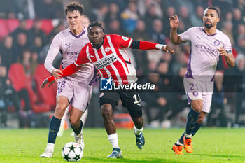 2024-11-05 - Johan Bakayoko of PSV and Selvi Clua of Girona during the UEFA Champions League, League Phase, football match between PSV Eindhoven and Girona FC on November 5, 2024 at Philips Stadion in Eindhoven, Netherlands - FOOTBALL - CHAMPIONS LEAGUE - PSV EINDHOVEN V GIRONA - UEFA CHAMPIONS LEAGUE - SOCCER